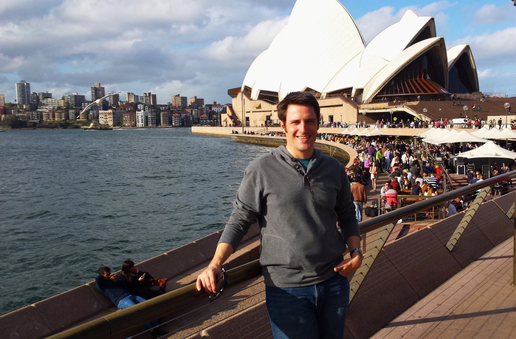 Chad Fenner posing in front of the Sydney Opera House during one of his executive trips to Australia